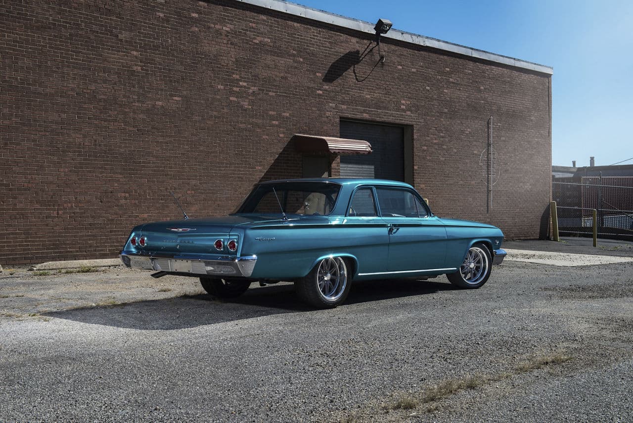 Side profile of 1962 Chevrolet Biscayne with wheels