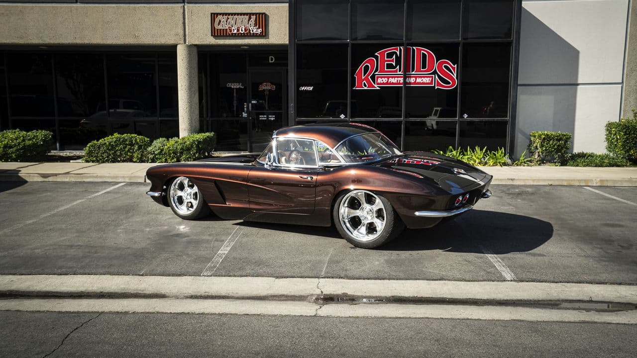 Side profile of 1962 Chevrolet Corvette with wheels