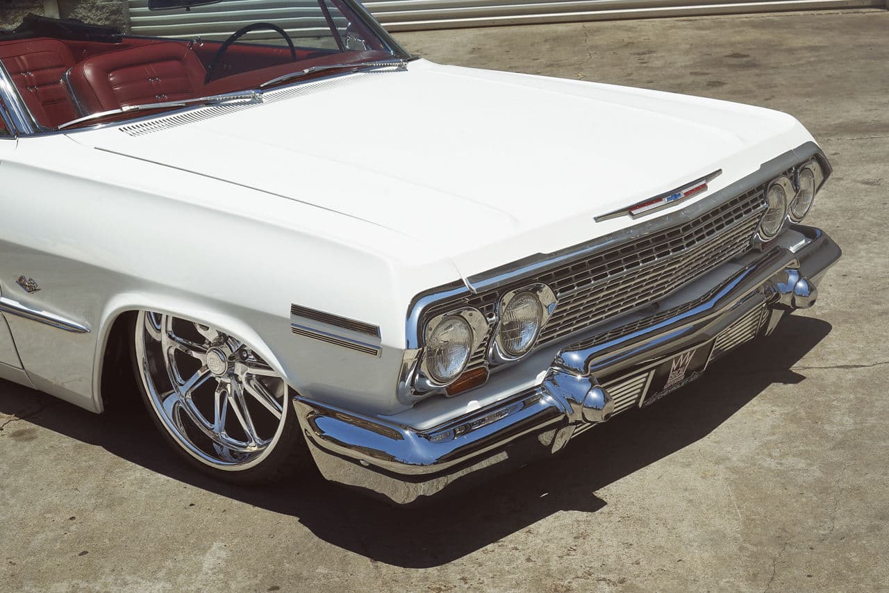 Side profile of 1963 Chevrolet Impala with wheels