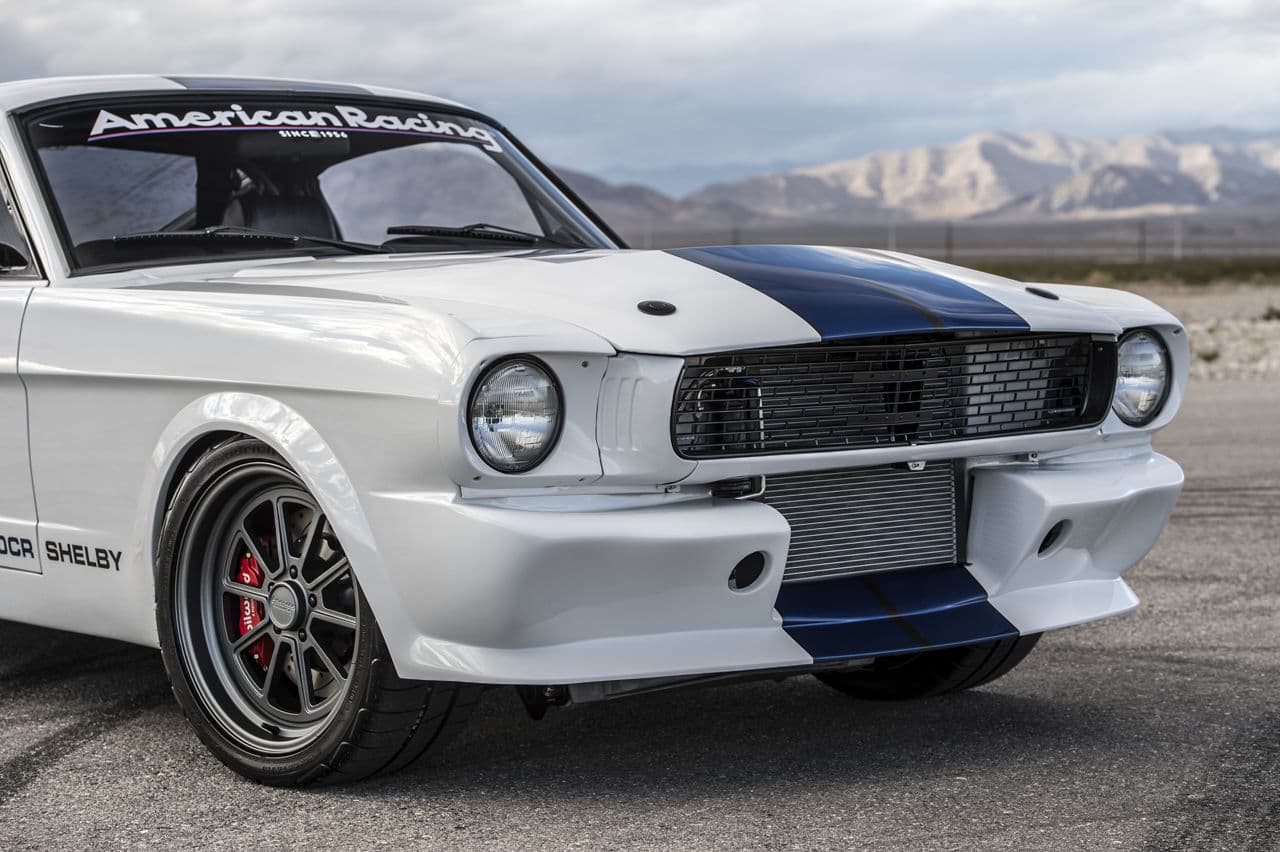 Detail view of 1965 Ford Mustang with wheels
