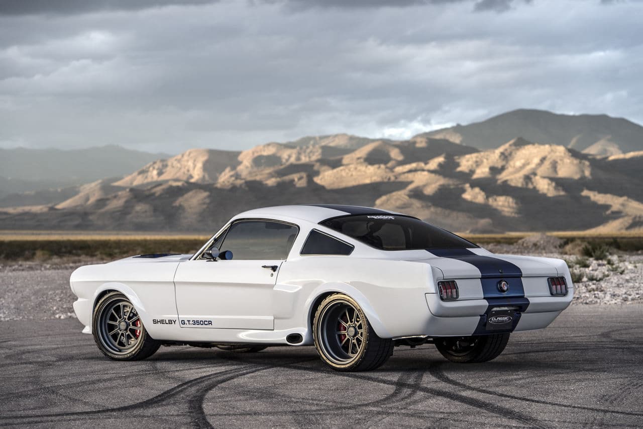 Side profile of 1965 Ford Mustang with wheels