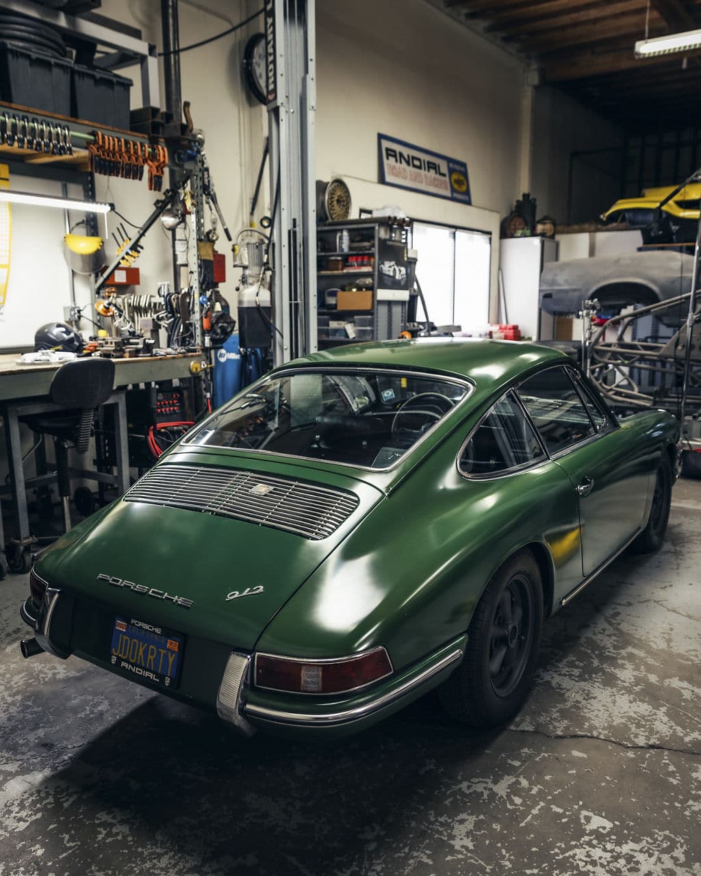 Rear view of 1966 Porsche 912 with vehicle wraps