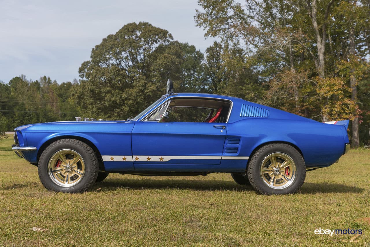 Side profile of 1967 Ford Mustang with wheels