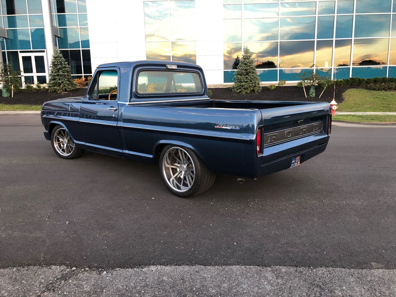Rear view of 1968 Ford F100 with wheels