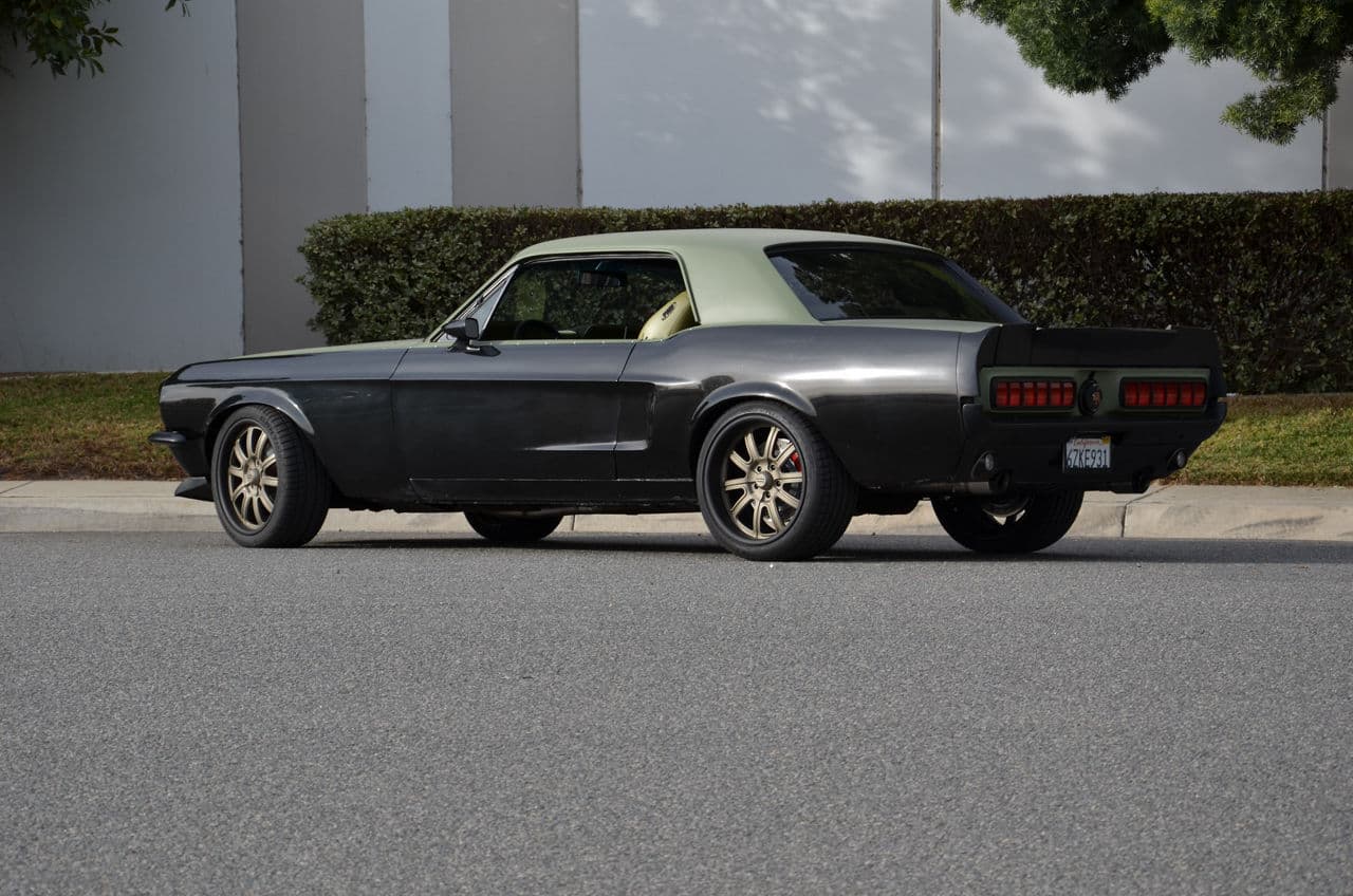 Side profile of 1968 Ford Mustang with wheels