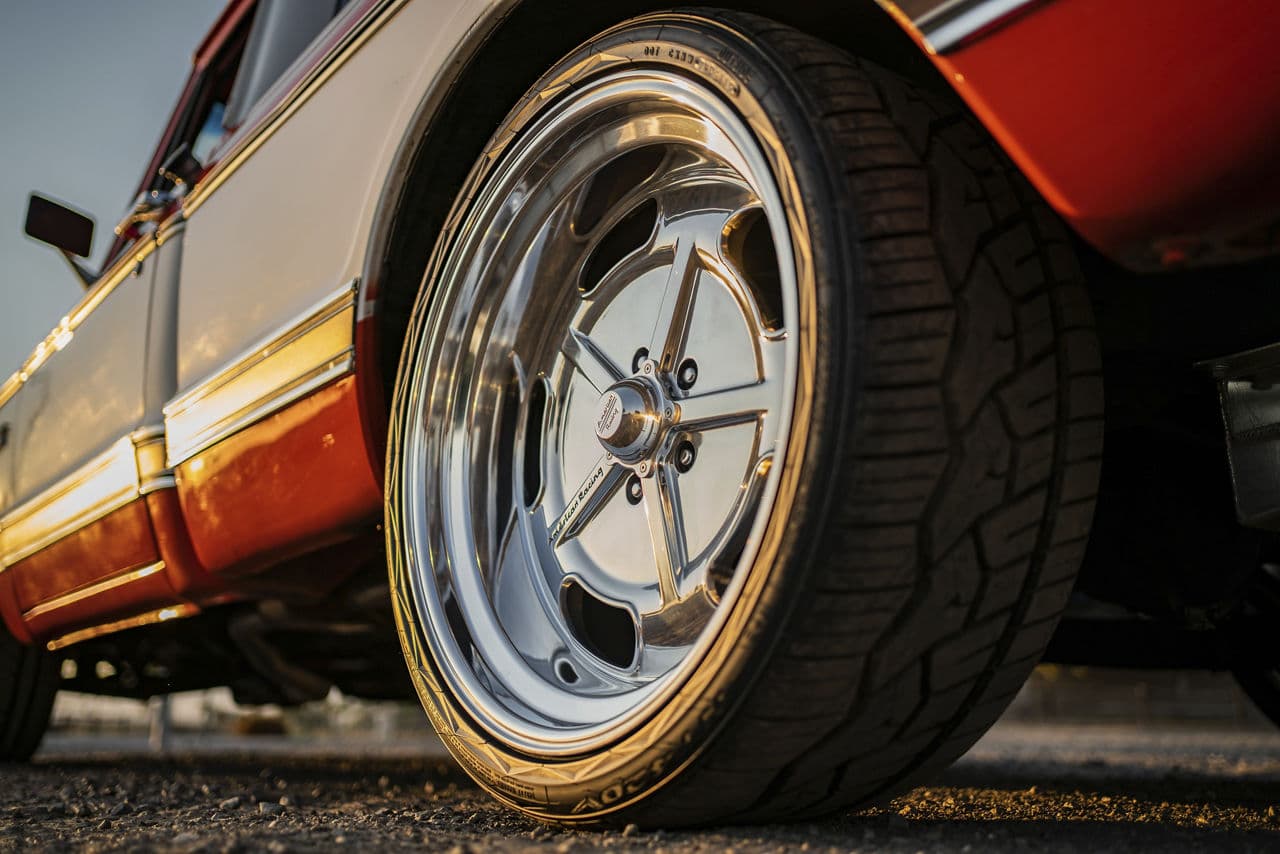 Detail view of 1970 GMC C10 with wheels