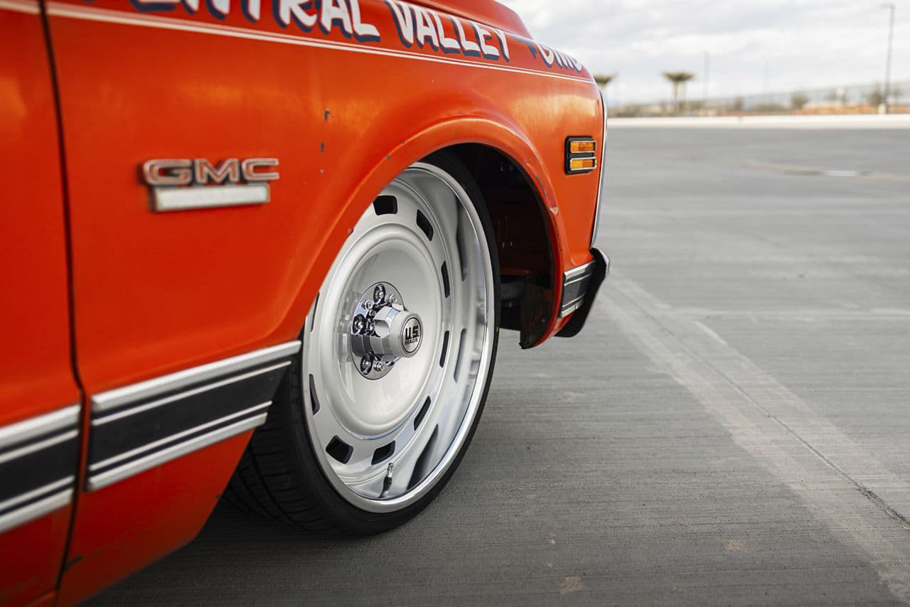 Side profile of 1970 GMC C10 with wheels
