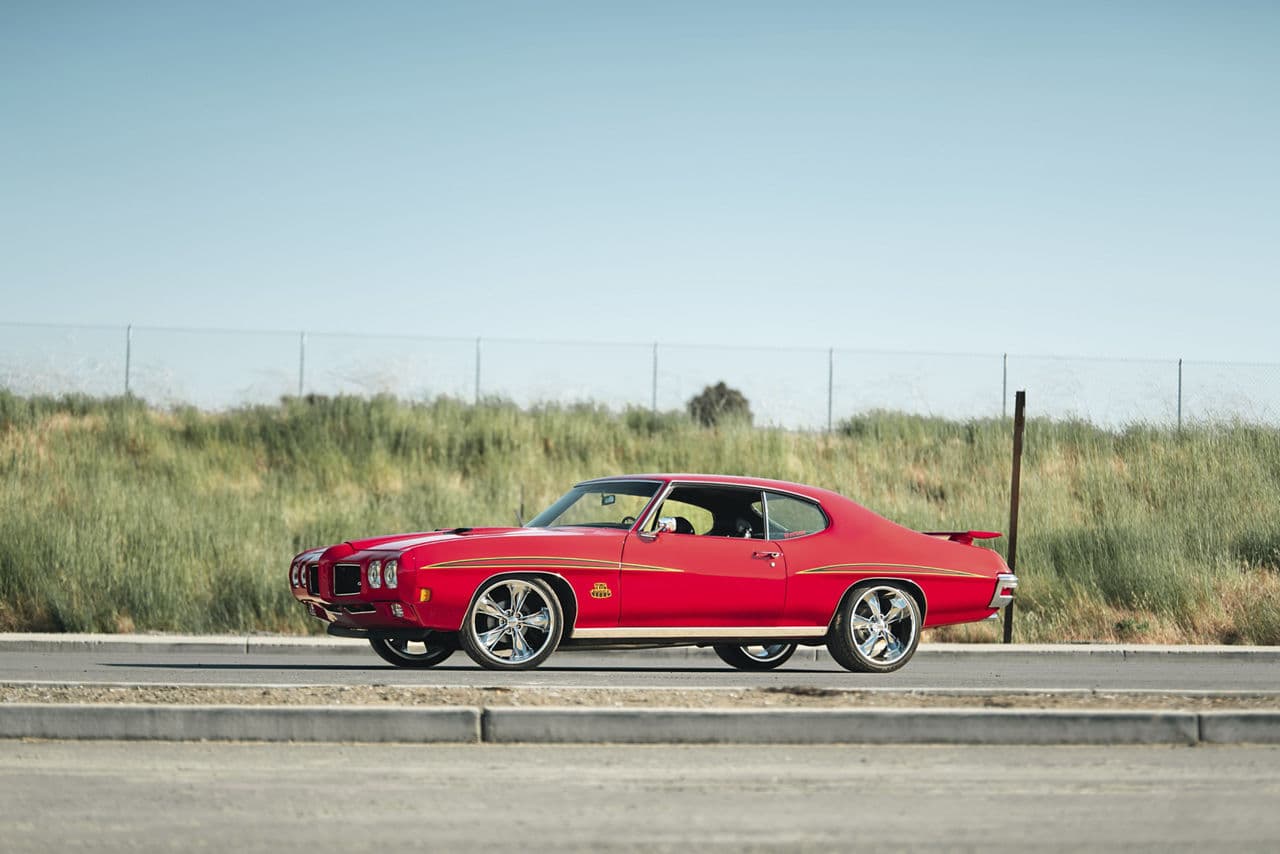 Side profile of 1970 Pontiac GTO with wheels
