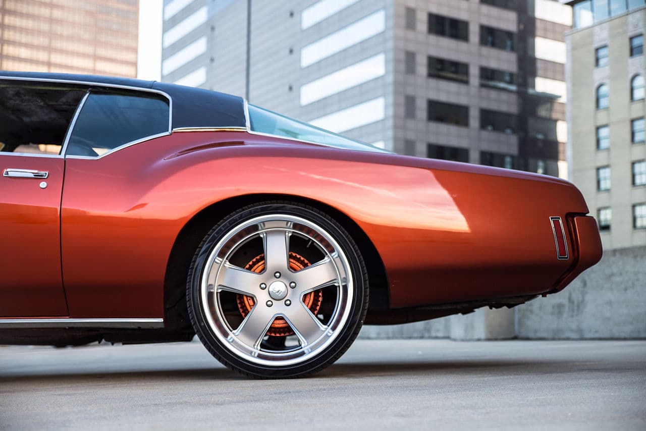 Side profile of 1972 Buick Riviera with wheels