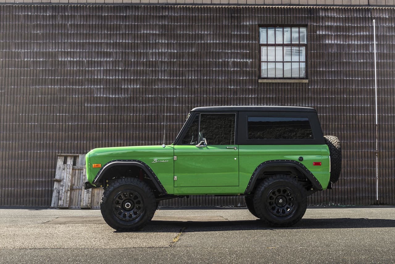 Side profile of 1973 Ford Bronco with wheels