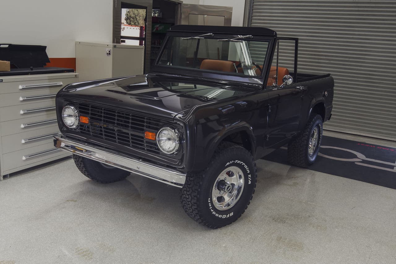 Side profile of 1973 Ford Bronco with wheels