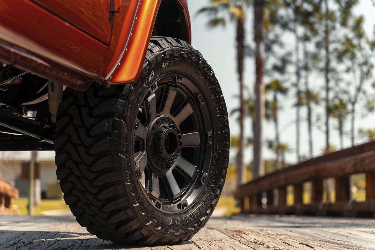 Detail view of 1975 Ford Bronco with wheels