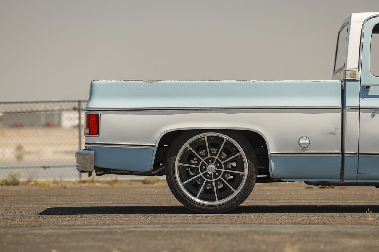 Detail view of 1976 Chevrolet C10 with wheels