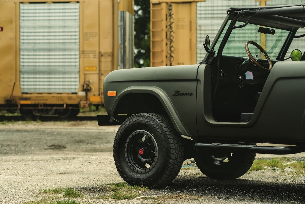 Detail view of 1977 Ford Bronco with truck suv wheels