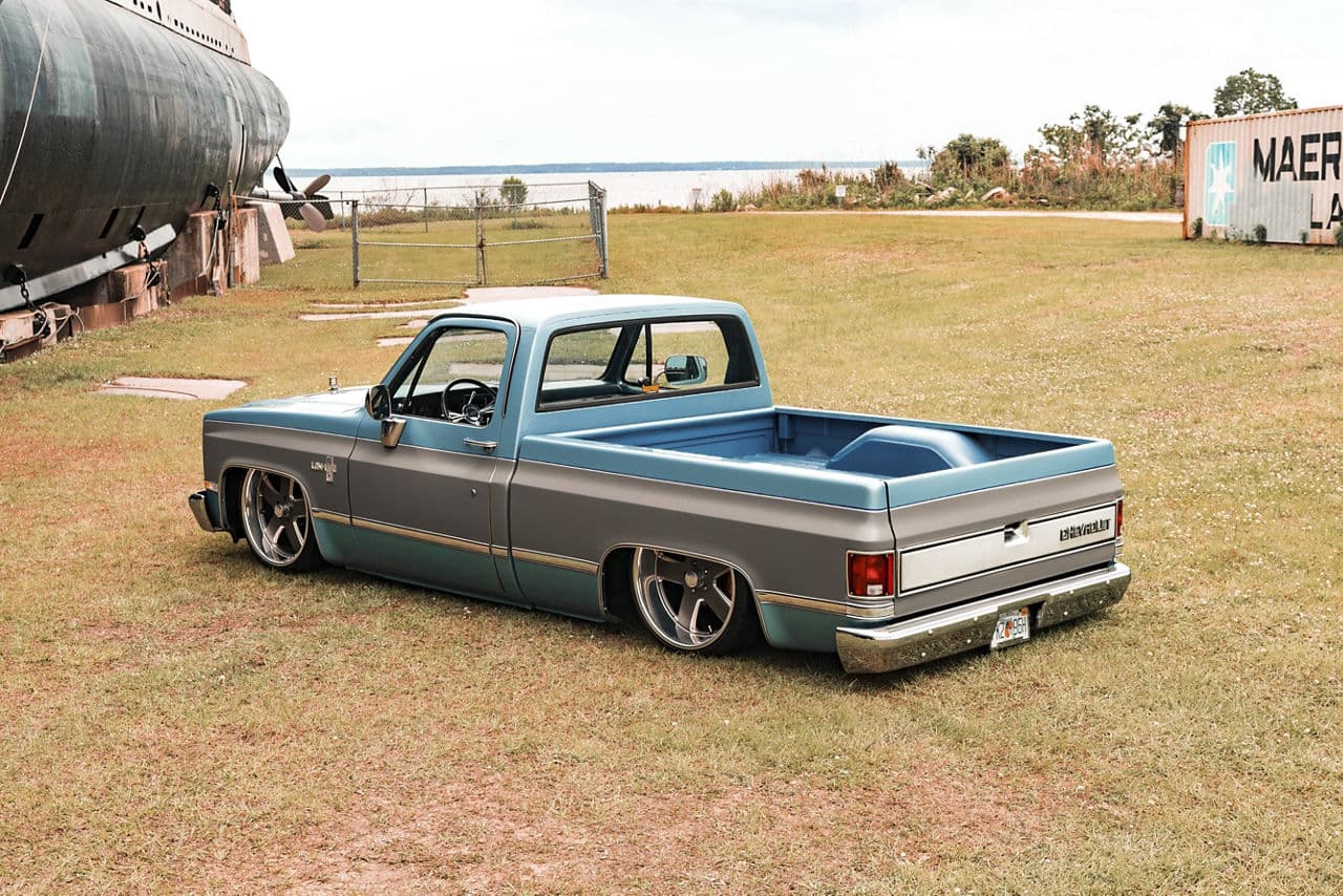 Detail view of 1985 Chevrolet C10 with wheels