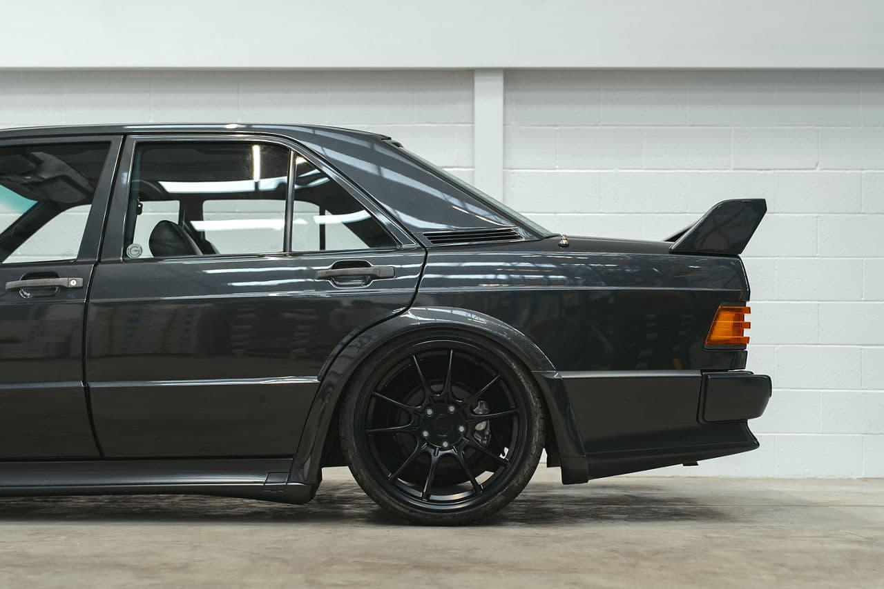 Detail view of 1986 Mercedes-Benz 190e with wheels