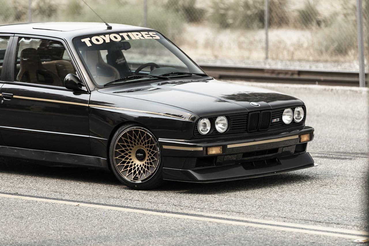 Side profile of 1987 BMW E30 with wheels