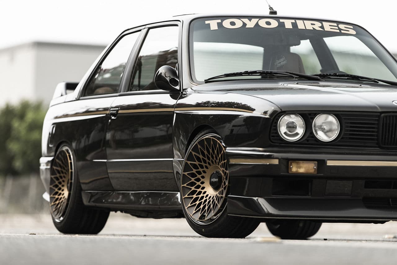 Rear view of 1987 BMW E30 with wheels