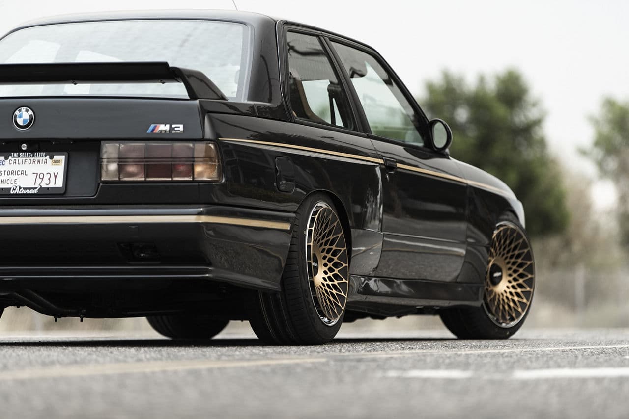 Detail view of 1987 BMW E30 with wheels