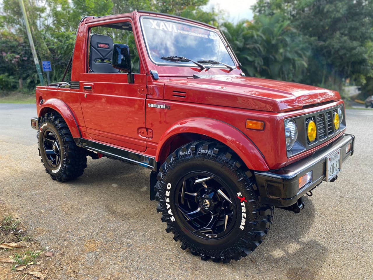 Rear view of 1989 Suzuki Samarai with truck suv wheels