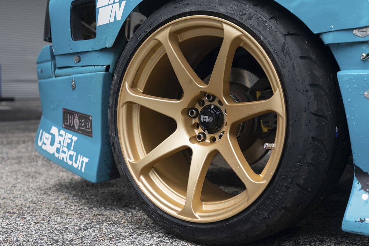 Side profile of 1990 Mazda RX7 with wheels