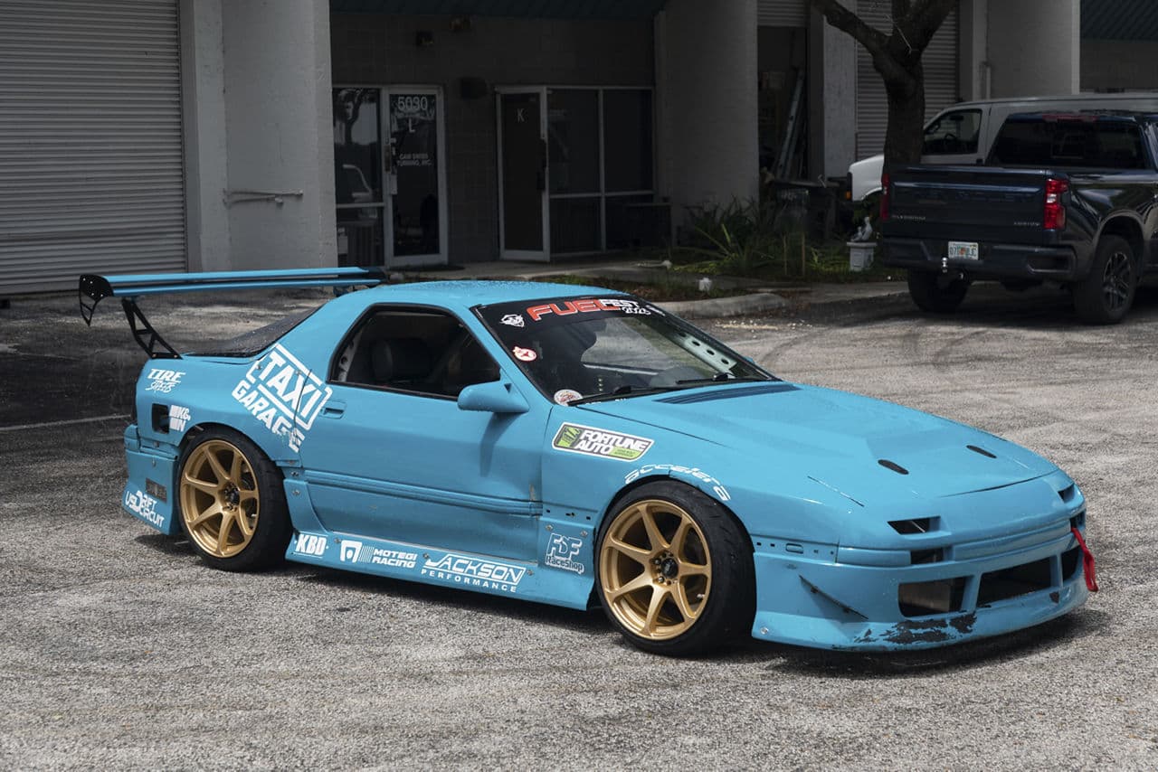 Rear view of 1990 Mazda RX7 with wheels