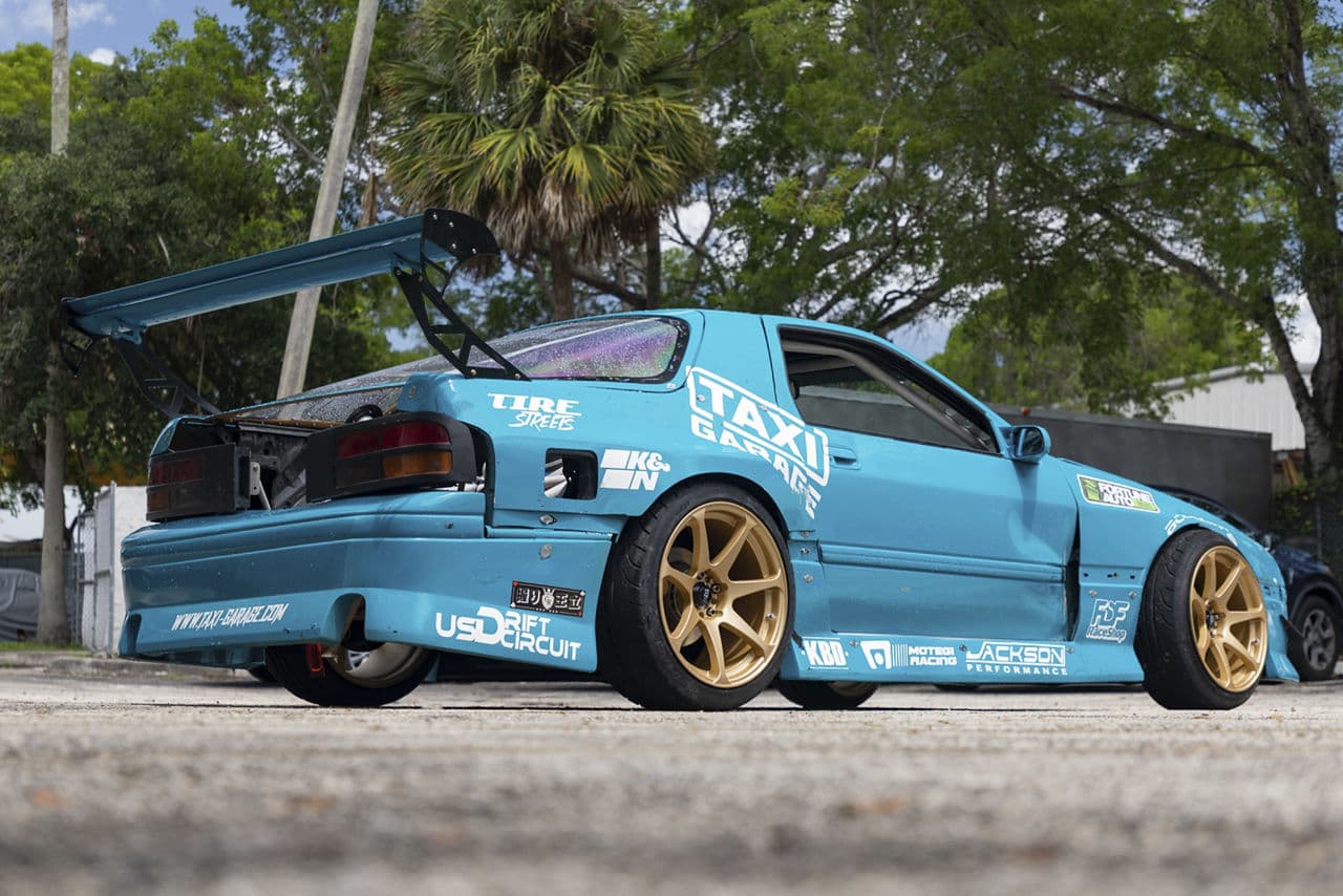 Detail view of 1990 Mazda RX7 with wheels
