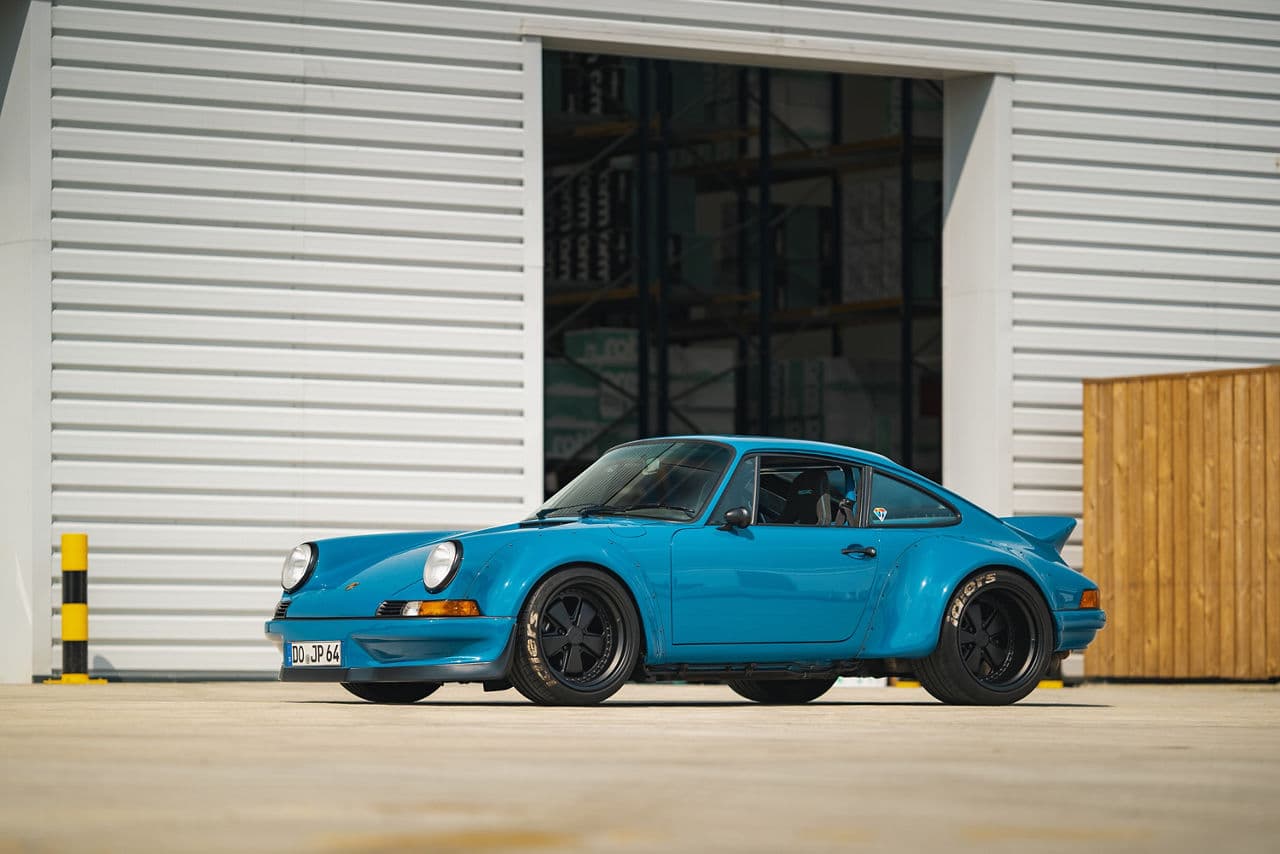 Front view of 1990 Porsche 911 RWB with wheels