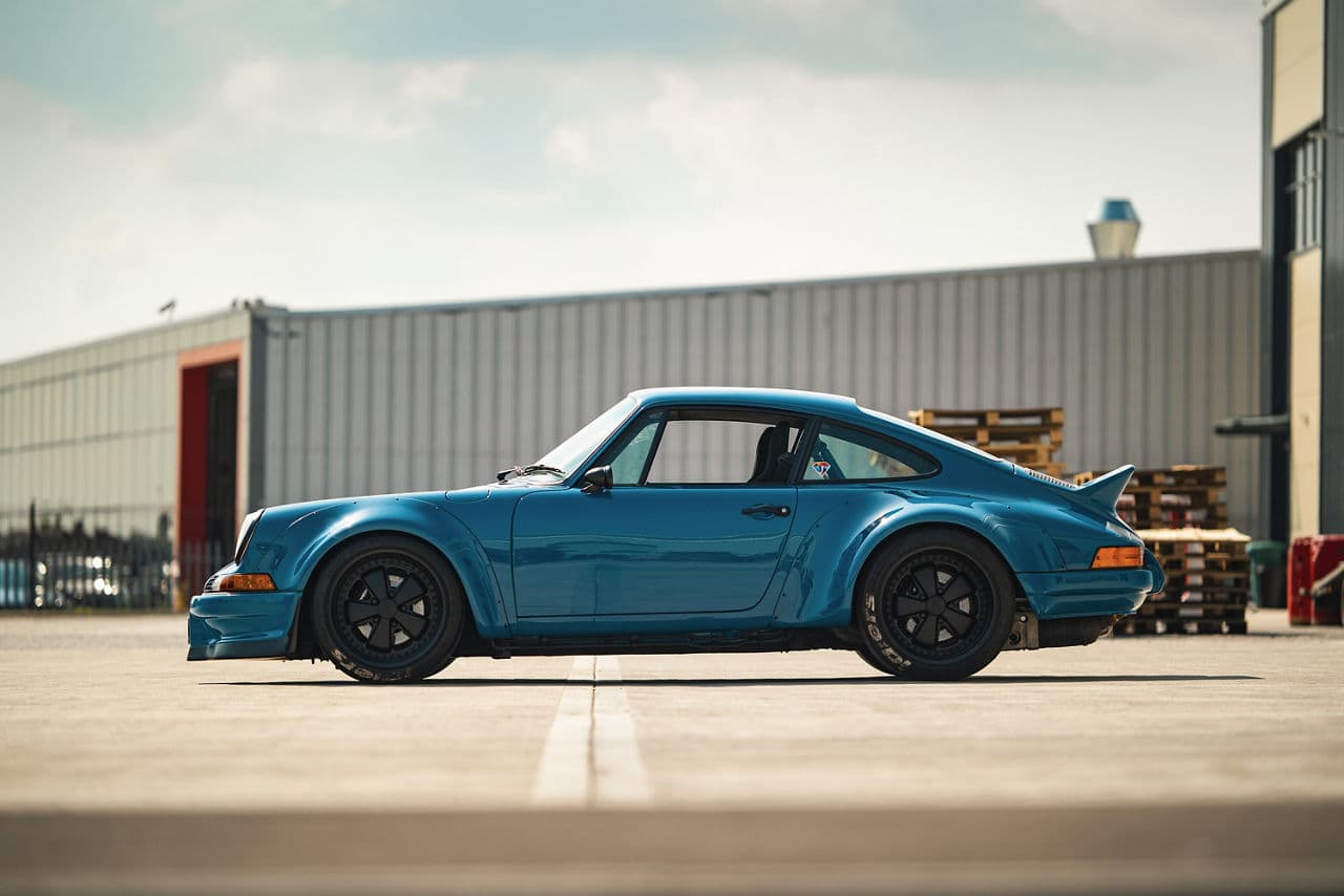 Side profile of 1990 Porsche 911 RWB with wheels