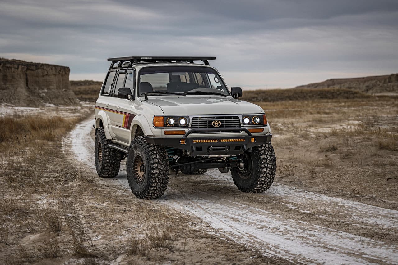 Side profile of 1990 Toyota Land Cruiser with truck suv wheels