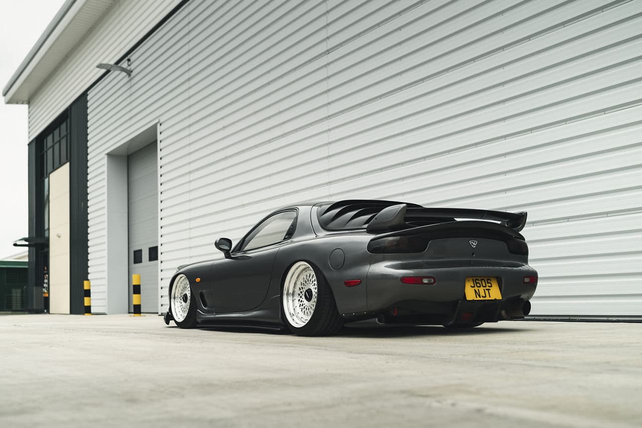 Side profile of 1994 Mazda RX7 with wheels