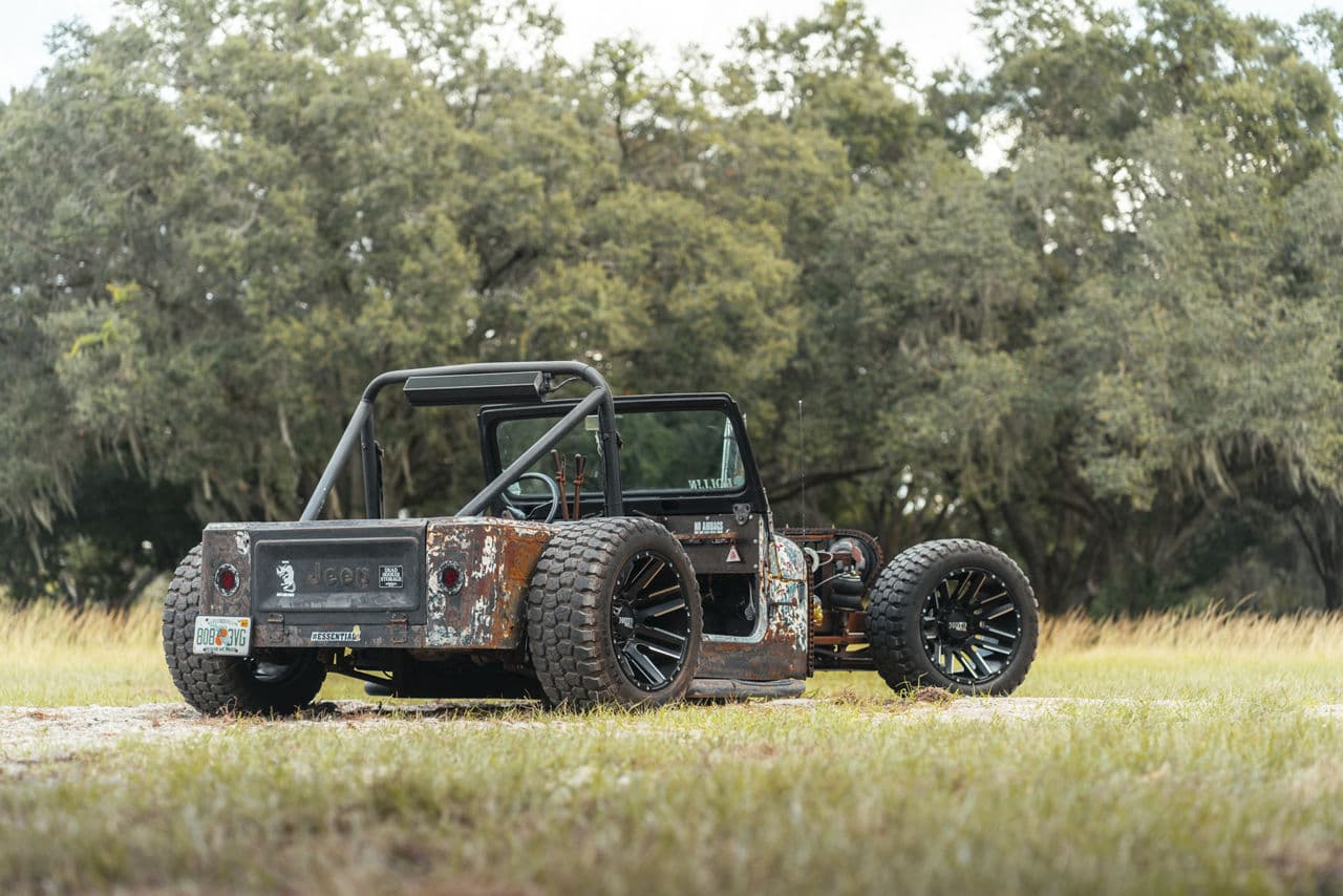 Front view of 1995 Jeep Rat Rod with wheels