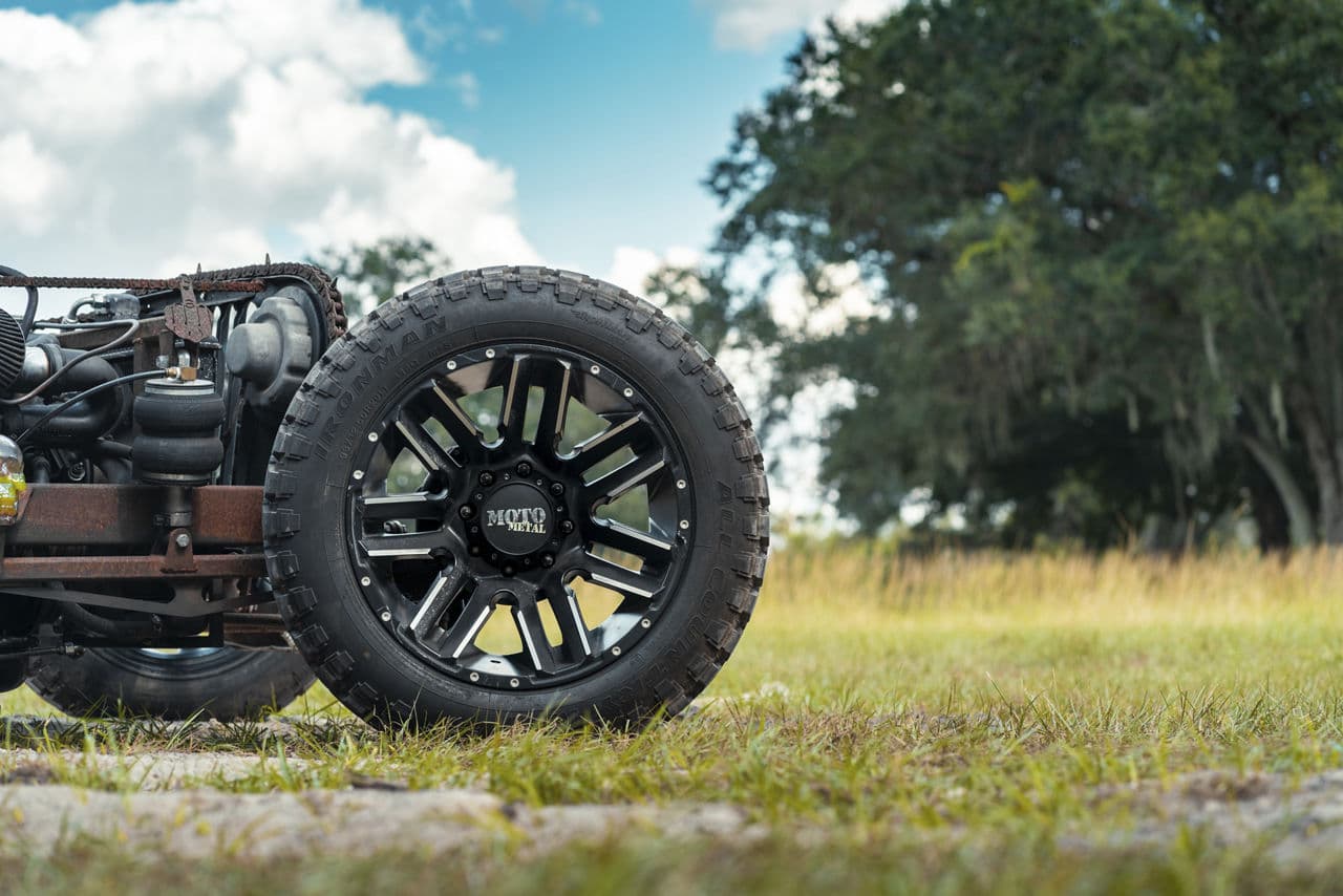 Side profile of 1995 Jeep Rat Rod with wheels
