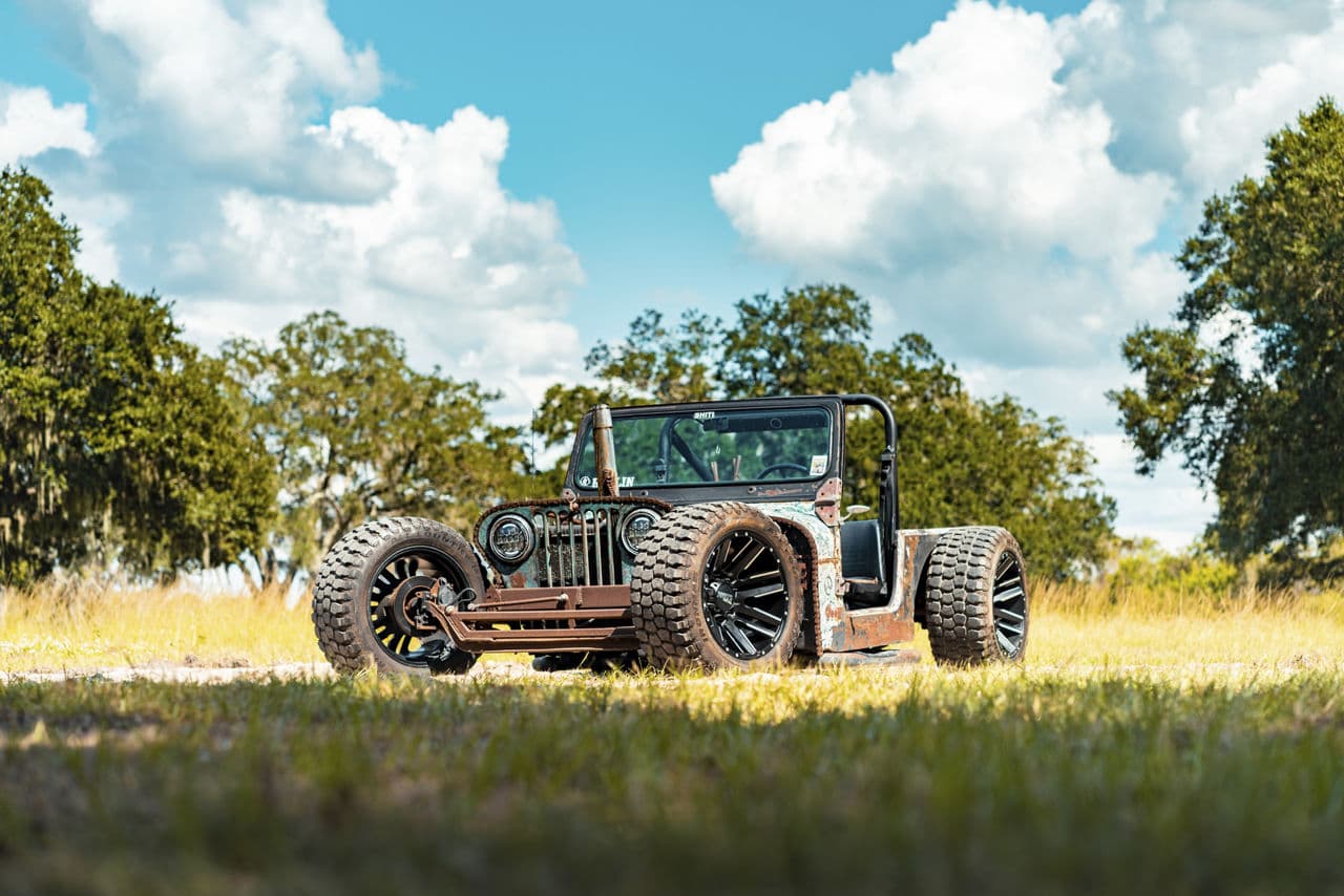 Detail view of 1995 Jeep Rat Rod with wheels