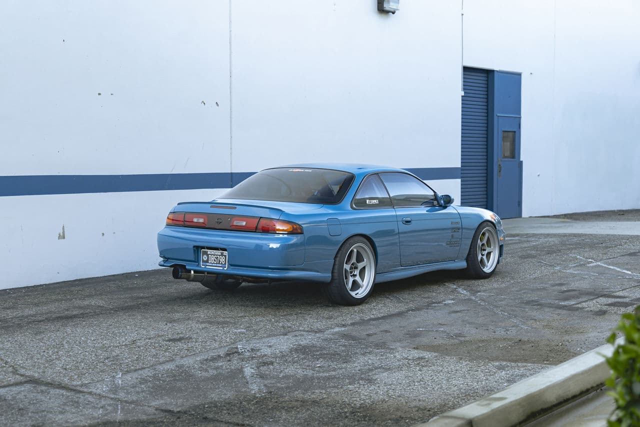 Side profile of 1995 Nissan Silvia with wheels