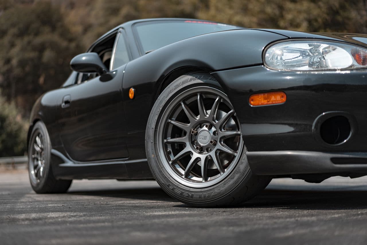 Interior of 2002 Mazda Miata with wheels