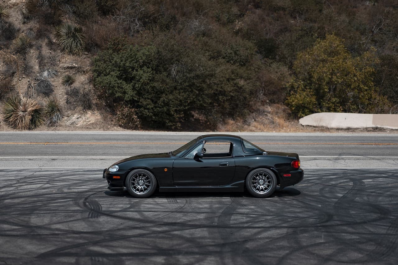 Detail view of 2002 Mazda Miata with wheels