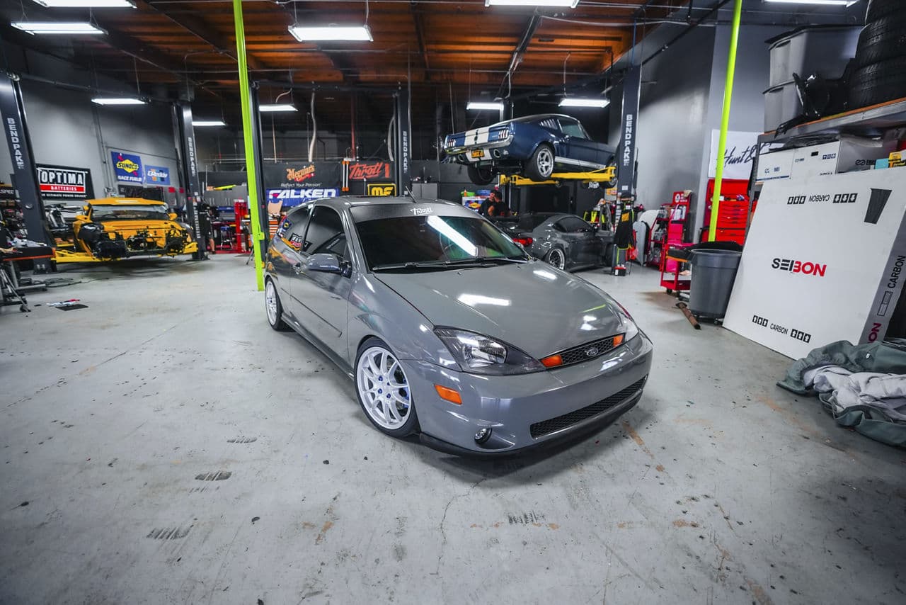 Side profile of 2004 Ford Focus SVT with vehicle wraps