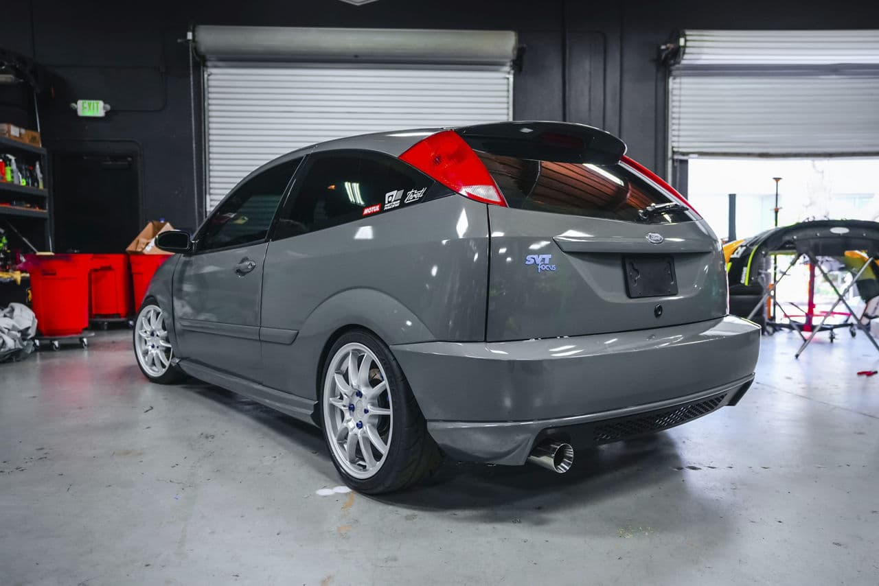Rear view of 2004 Ford Focus SVT with vehicle wraps
