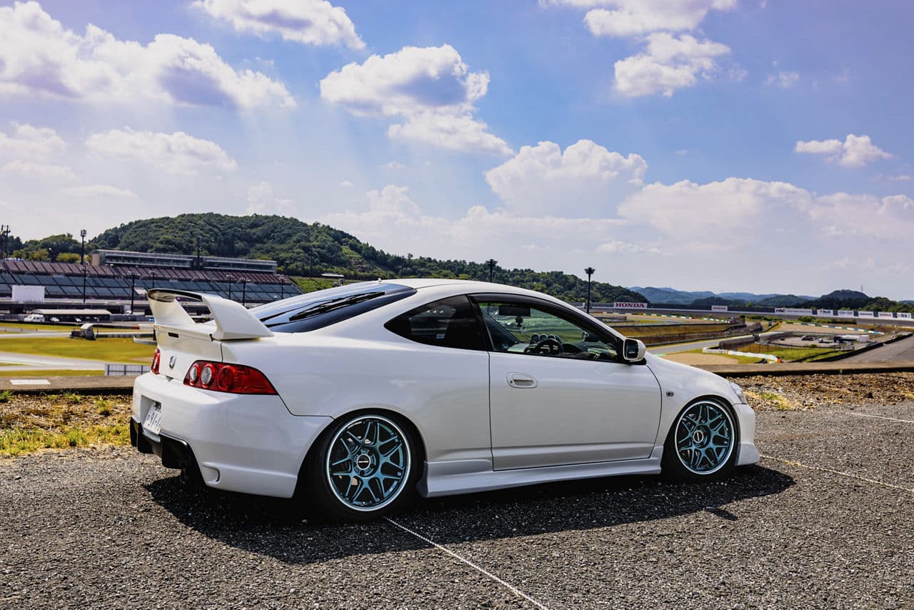 Front view of 2006 Honda Integra with vehicle wraps