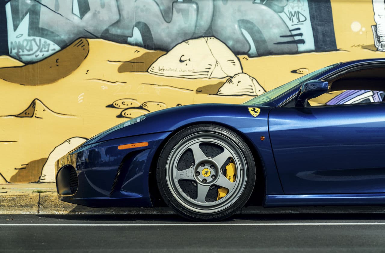 Rear view of 2009 Ferrari F430 with vehicle wraps