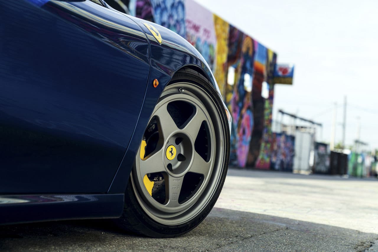 Detail view of 2009 Ferrari F430 with vehicle wraps