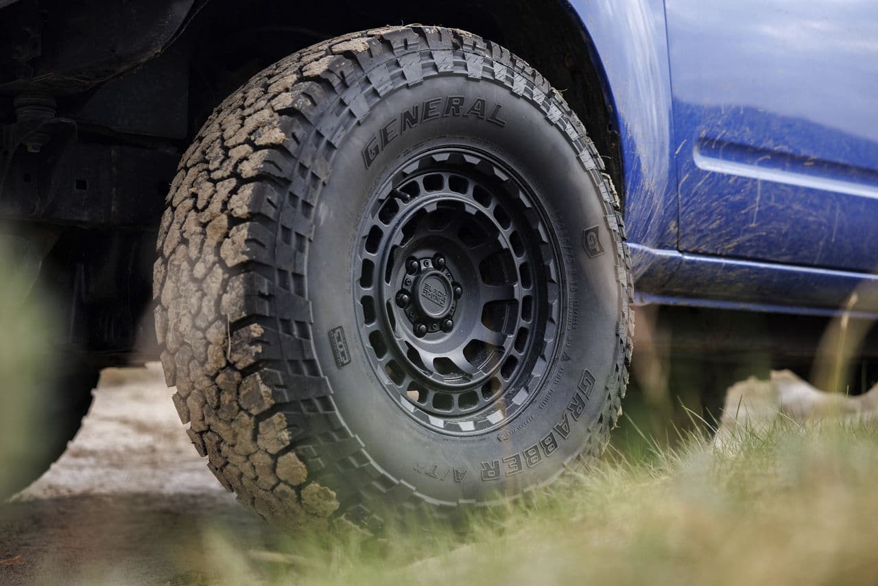 Side profile of 2009 Nissan XTerra with wheels