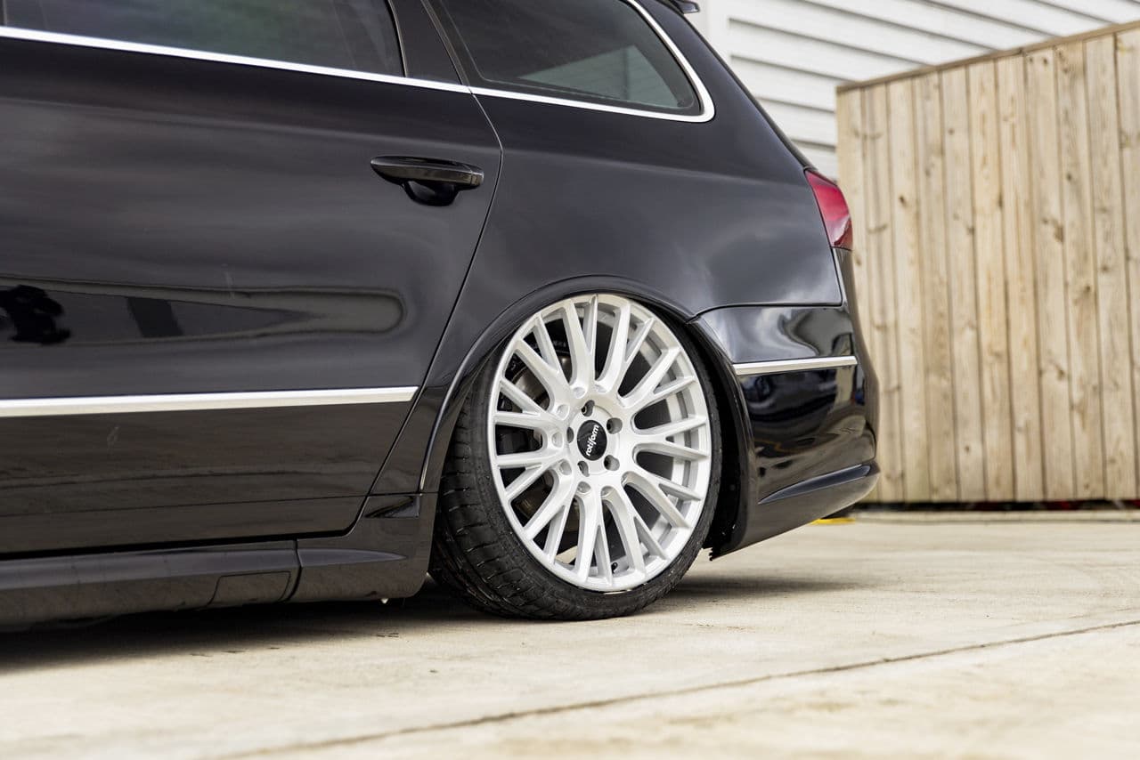Detail view of 2009 Volkswagen Passat with tuner wheels