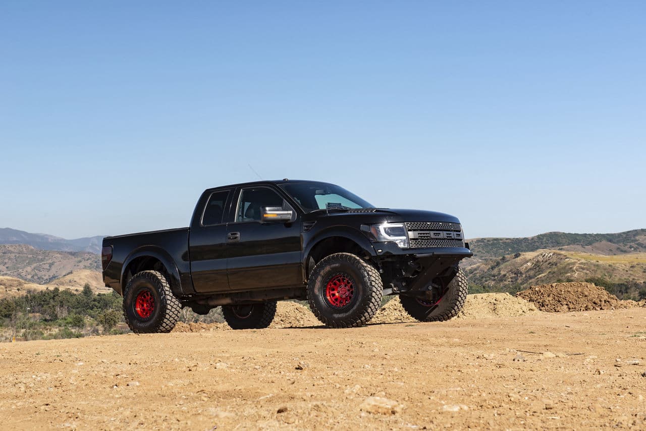 Detail view of 2011 Ford F150 Raptor with vehicle wraps