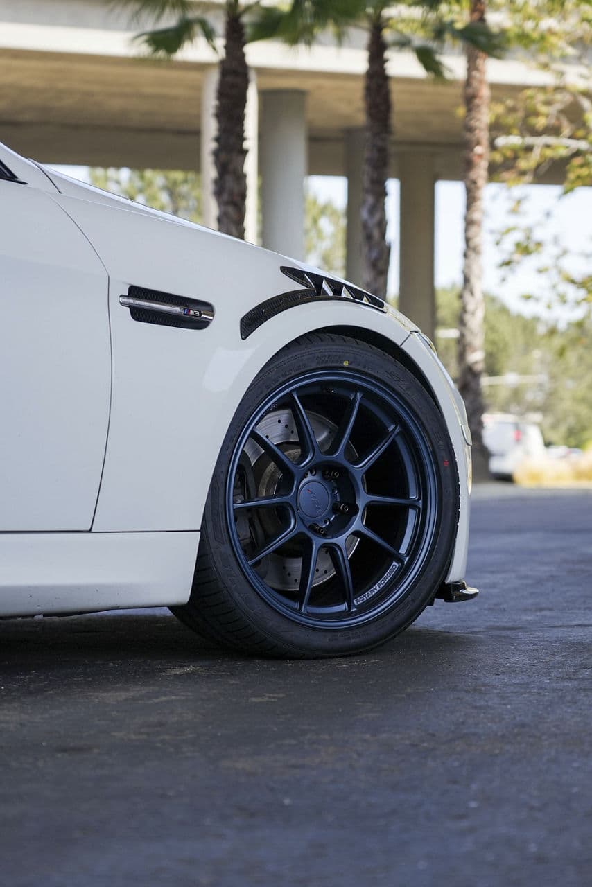 Rear view of 2013 BMW M3 with wheels