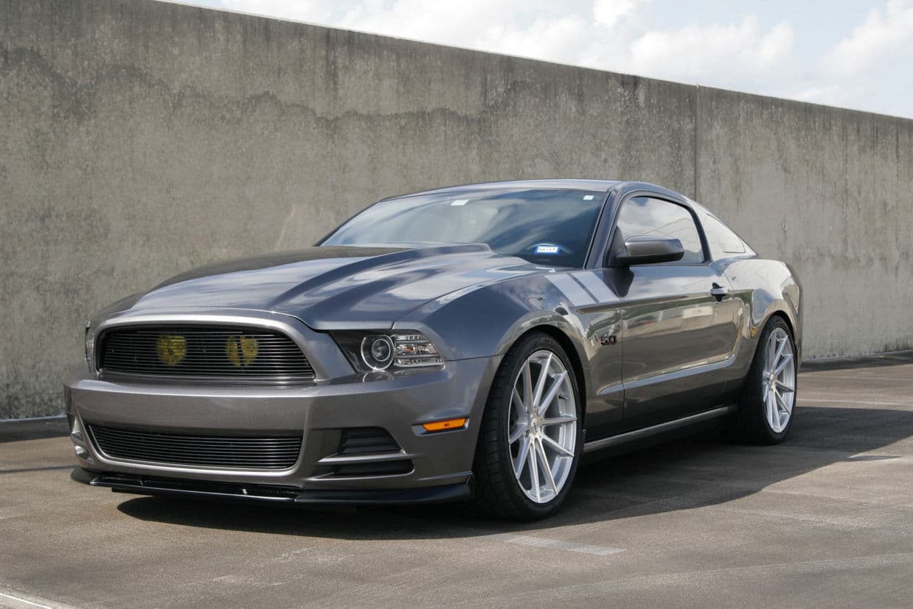 Side profile of 2013 Ford Mustang with wheels