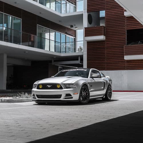 Side profile of 2013 Ford Mustang with wheels