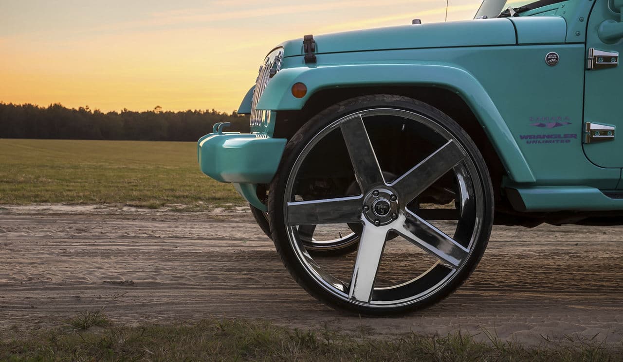 Rear view of 2013 Jeep Wrangler with truck suv wheels