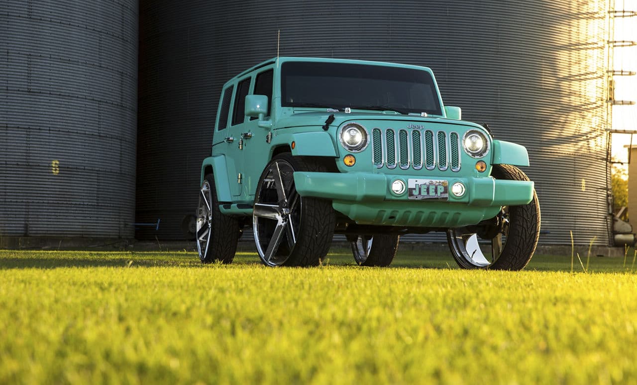 Detail view of 2013 Jeep Wrangler with truck suv wheels